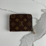 LOUIS VUITTON Porte-Monnaie Zippy