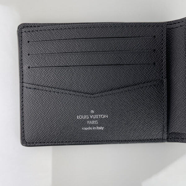 Louis Vuitton LV Portefeuille Slender MNG monogram éclipse toile à vendre neuf nouveau nouvelle d'occasion deuxième main seconde main pour hommes authentique luxe